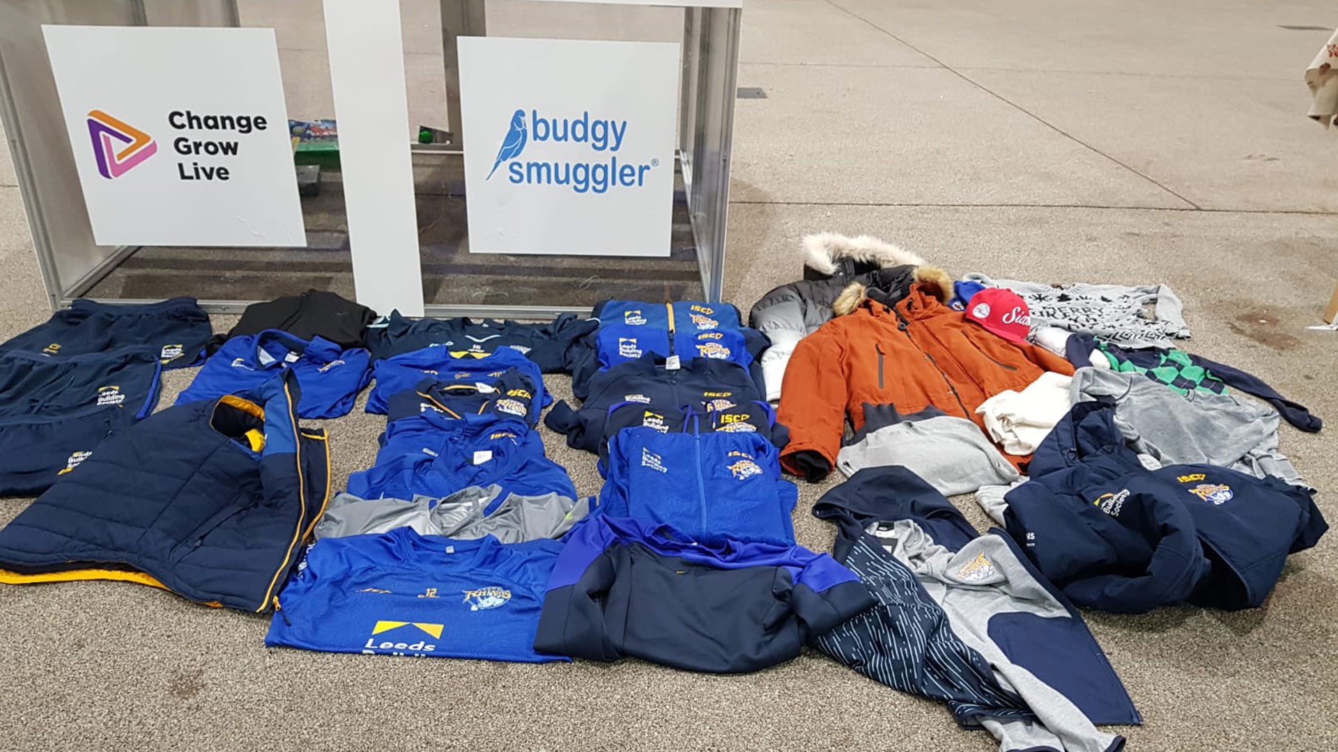 Photos of the rugby kit folded on the floor