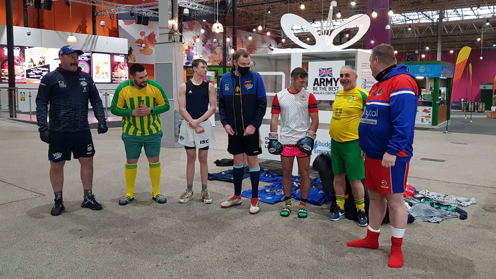 The rugby team stood in their kit