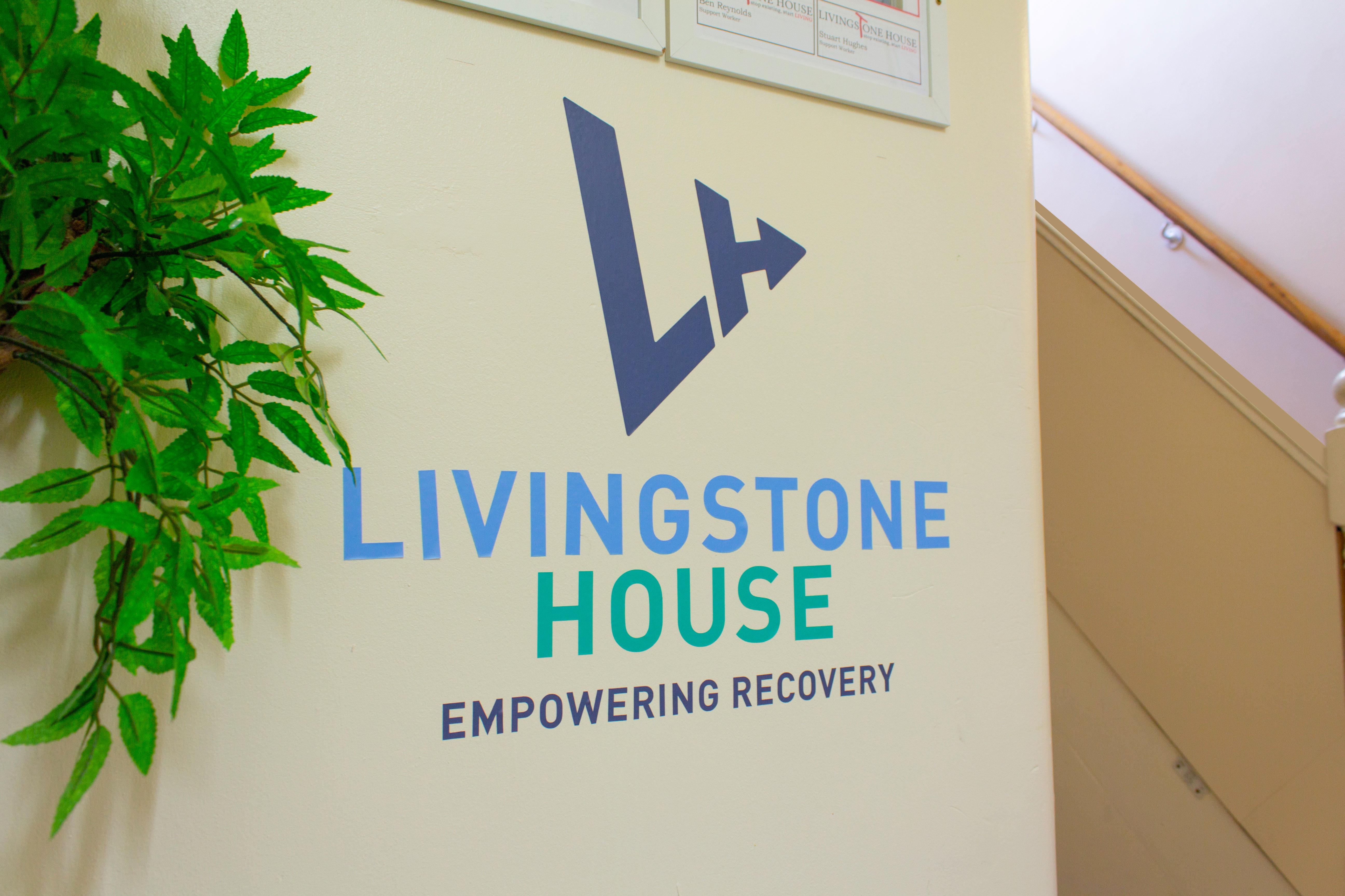 a photo of the Livingstone House logo on an internal wall