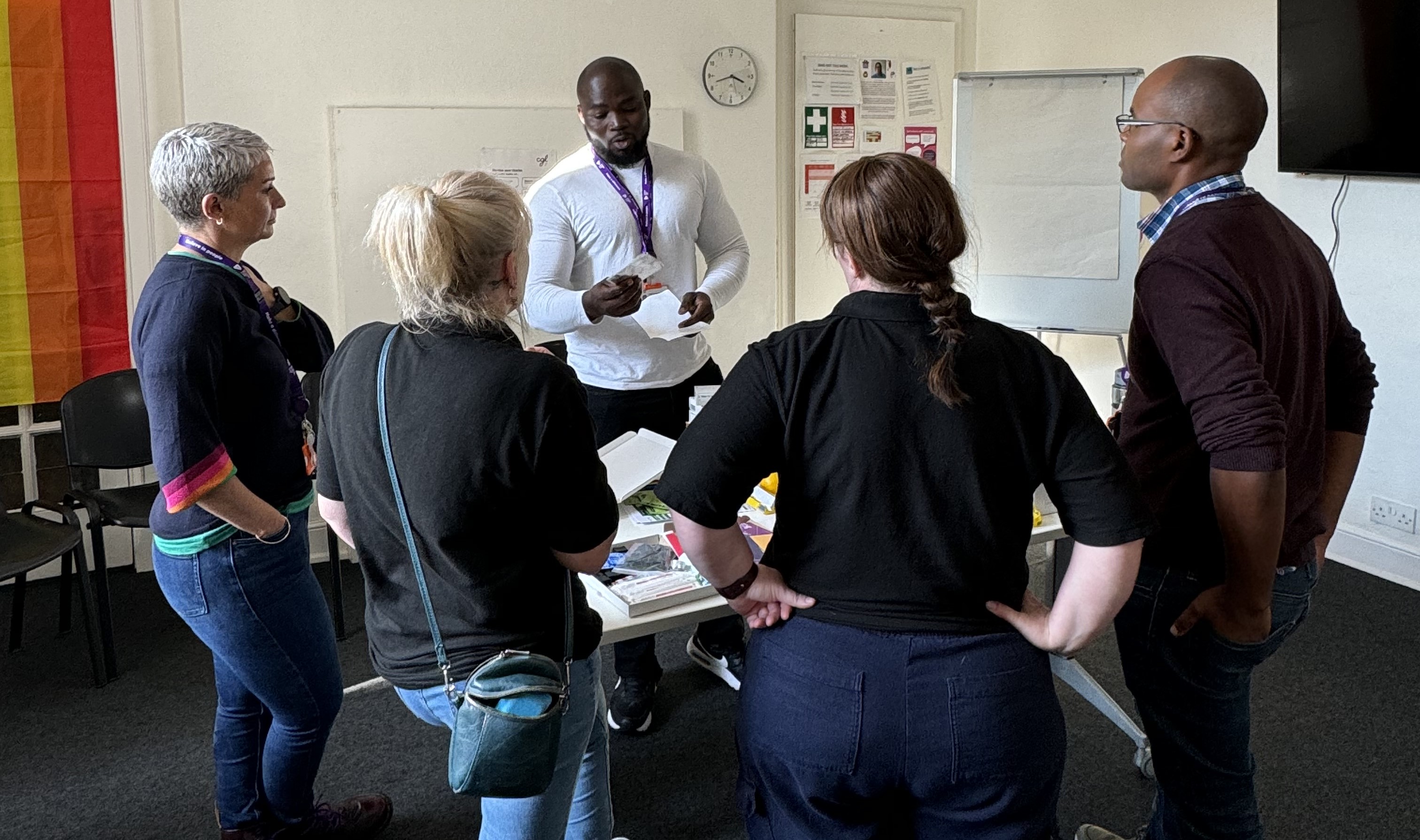 staff delivering a harm reduction advice
