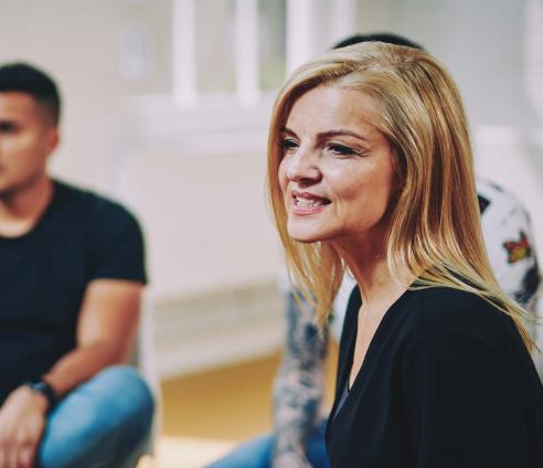 woman talking in a group